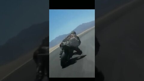 Most dangerous Biker Dragging head for cornering. bike racer used the helmet in perfect way.
