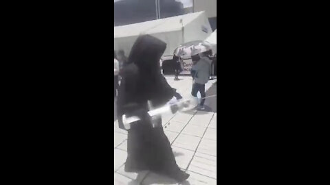 Grim Reaper Stalks Sheeple Lining up For Their Suicide-Shot 🤣 💉