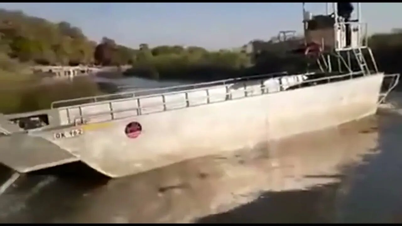 How not to unload a tractor.