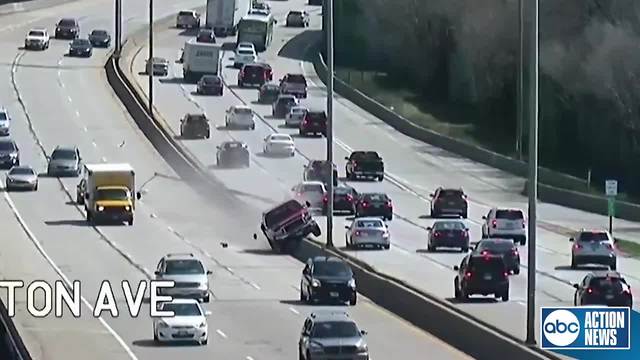 VIDEO | Out-of-control truck takes out light poles on Milwaukee freeway, driver arrested