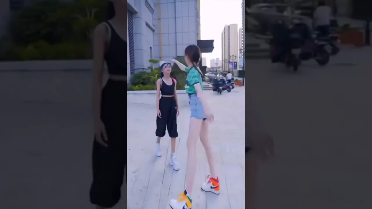 Very Happy Chinese Sisters Leave Us With a Smile