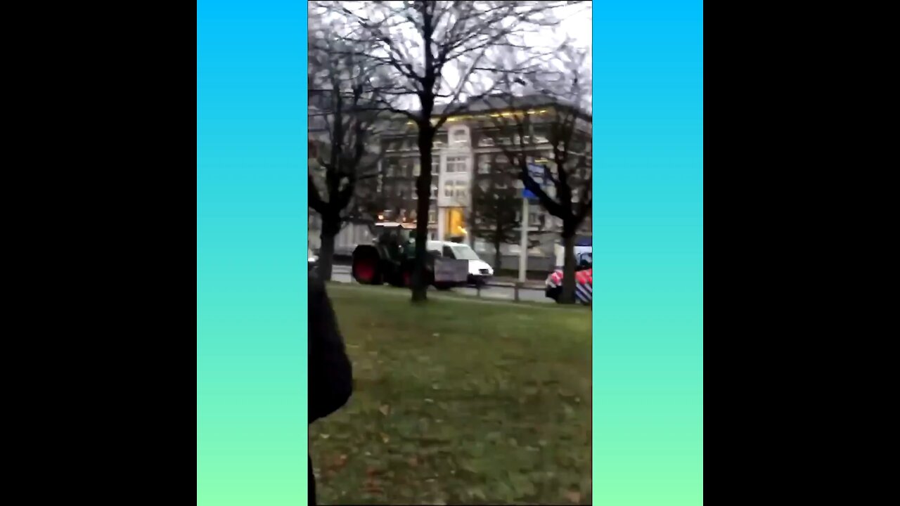 Dutch farmer tractor driving backwards chased by police