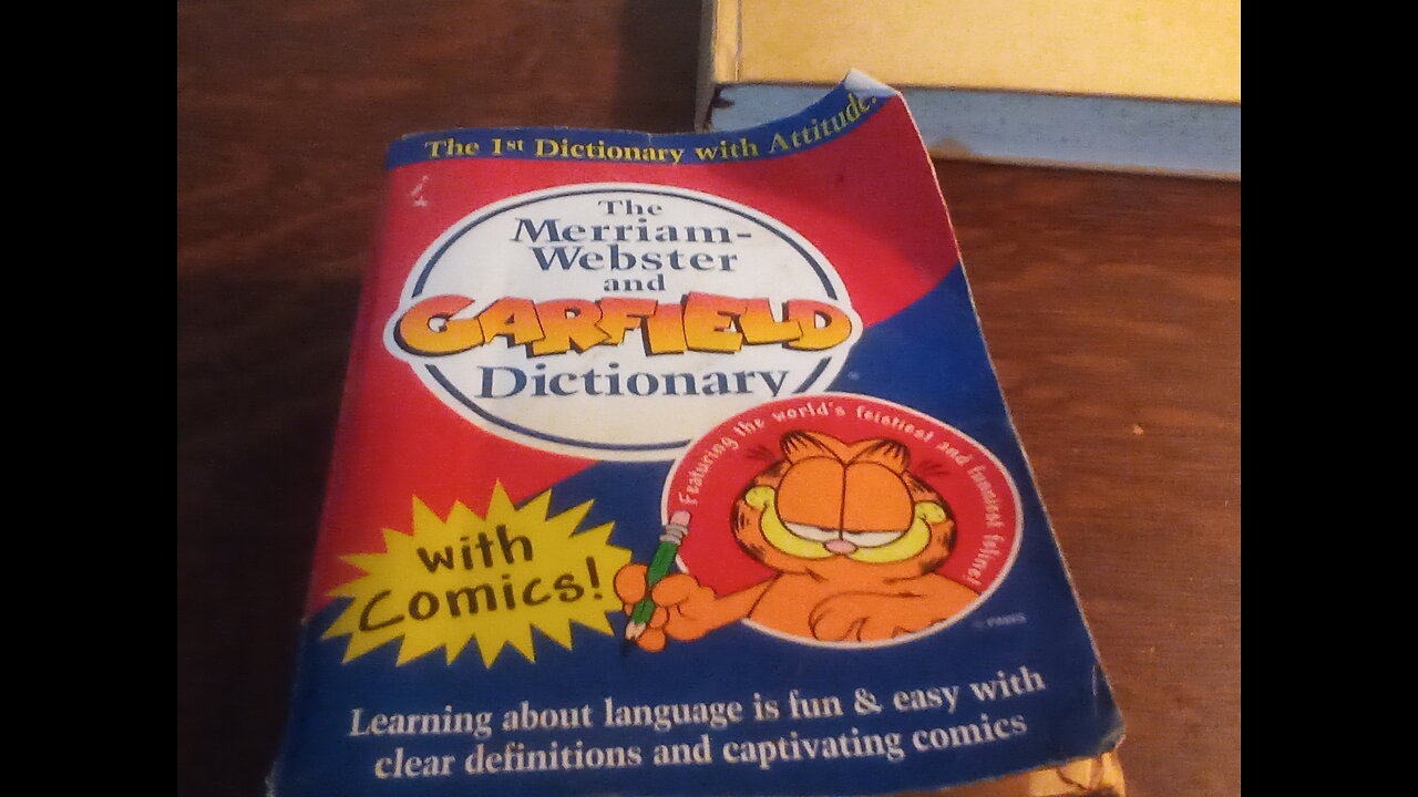 Cartoon Cat Garfield wrote a Cursed Dictionary