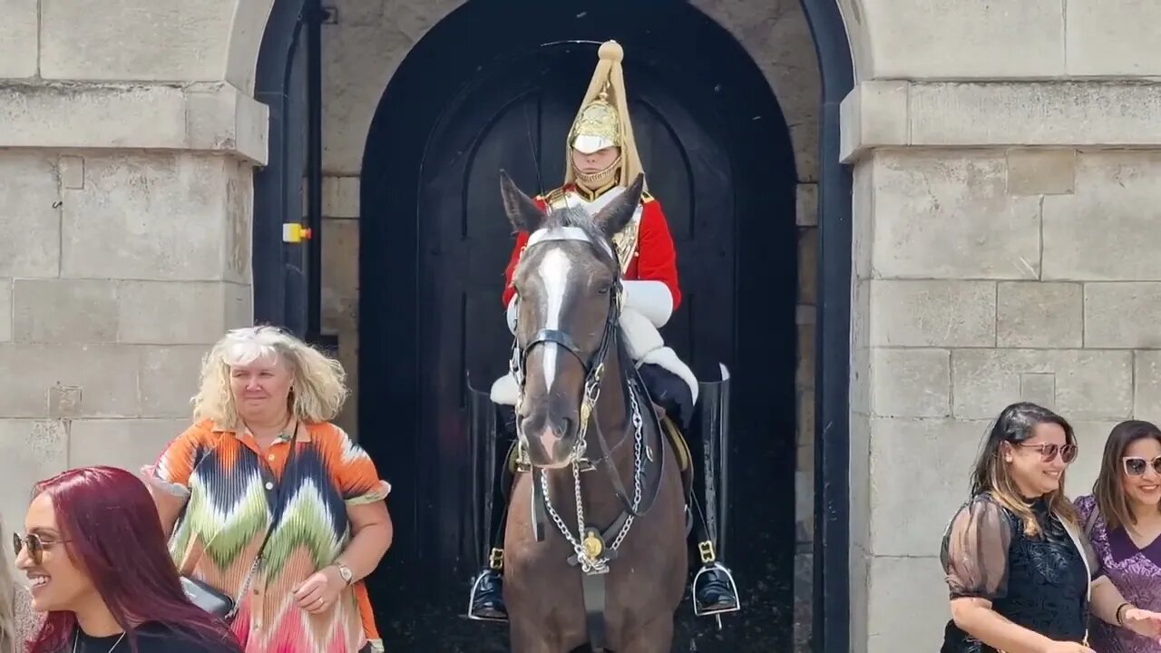 Guard tells one tourist to be careful with the selfie stick and another twice to get off the reins