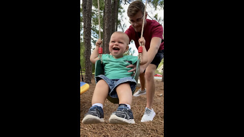 Baby uses sign language to request a swing