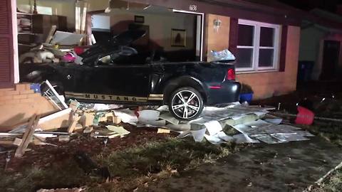 Car hits house in Wayne Township