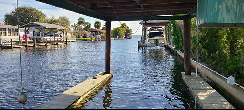 Sitting At The Dock of a Channel