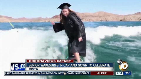 Senior wakesurfs in cap and gown to celebrate