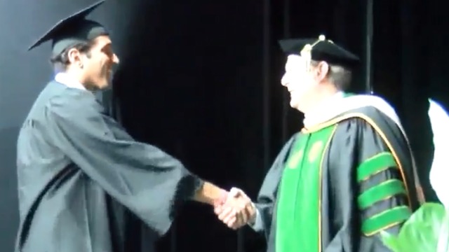 Man recovers from coma, graduates college