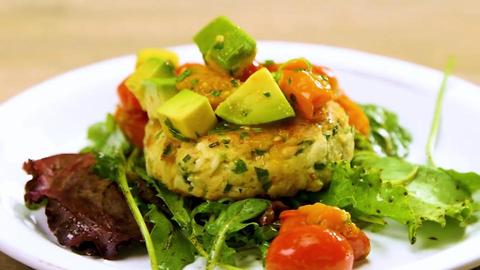 Fish Cakes with Avocado and Roasted Tomato Relish on Arugula Salad