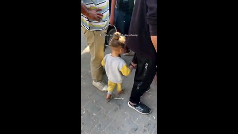 A girl in Gaza is found searching for food all alone