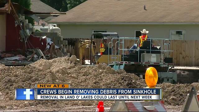 Crews recover cash, documents from Land O' Lakes sinkhole