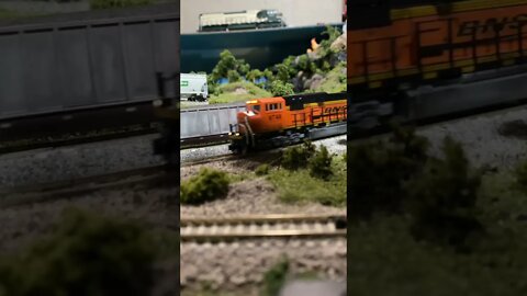 N Scale trains racing out the pass