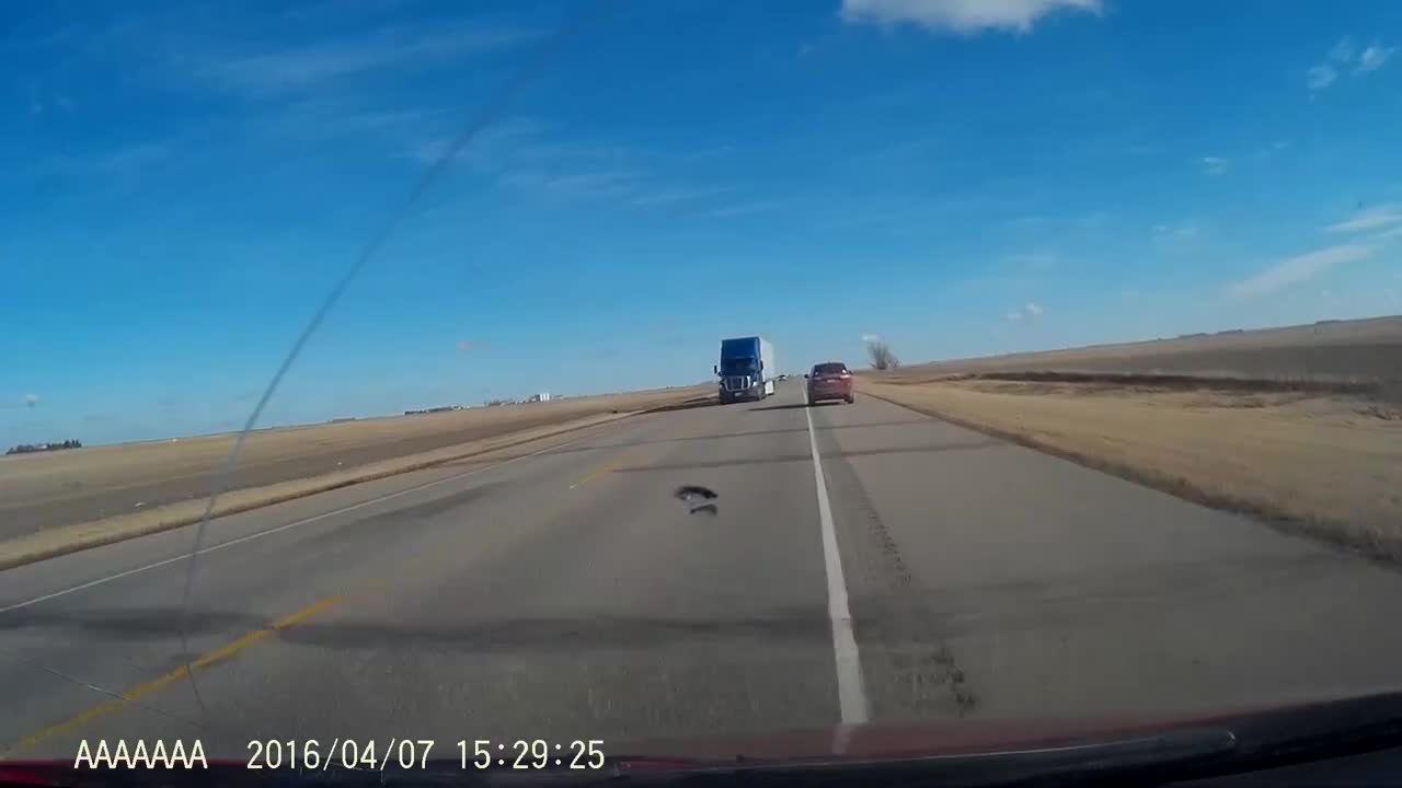 Reckless Trucker On Highway Nearly Hits Oncoming Cars