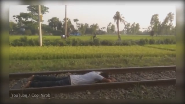 Man Performs Daring Train Stunt