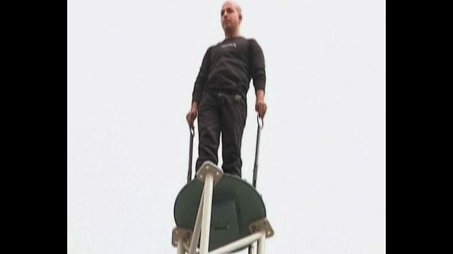 Man Stands On Pole For 35 Hours