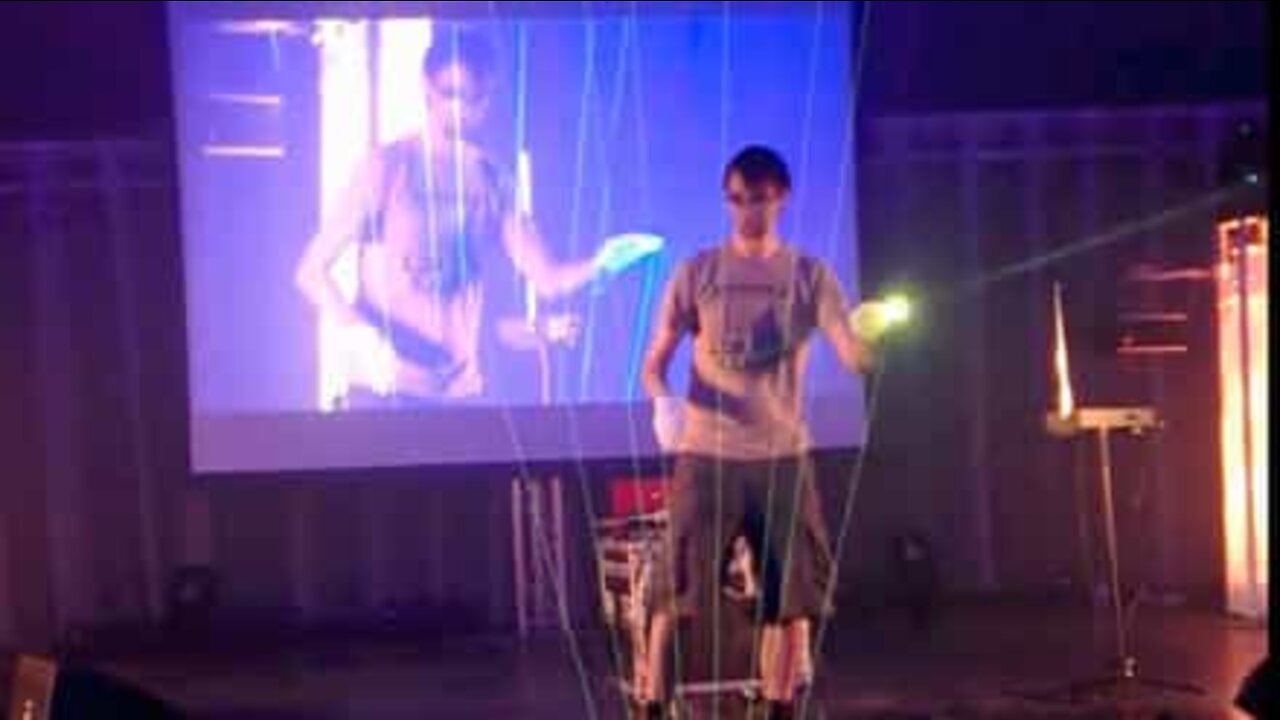 Man plays Tetris theme on a laser harp!