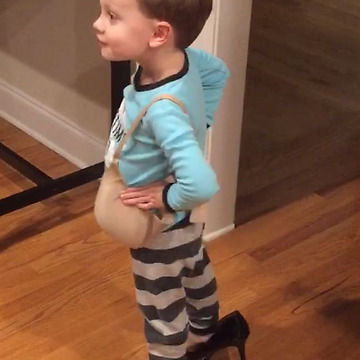 Little Man In Big Woman’s Clothes