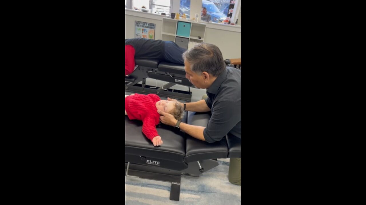 Adjusting a sleeping toddler