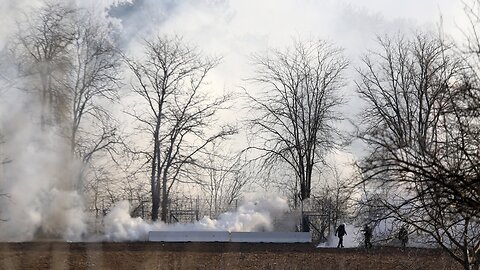 Greek police fire tear gas at migrants along Turkish border