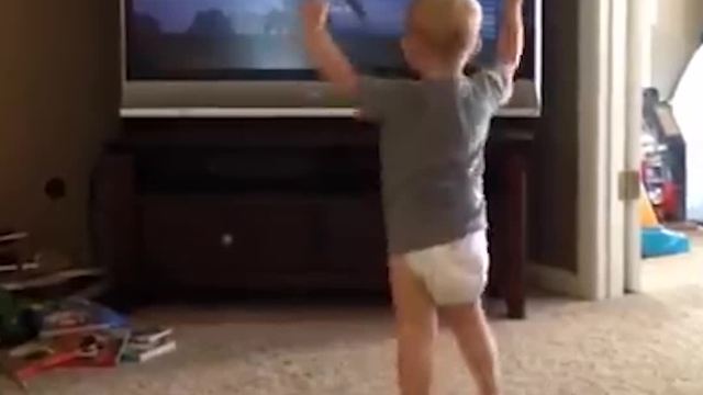 Little Baby Boy Works Out Perfectly To The Movie Rocky