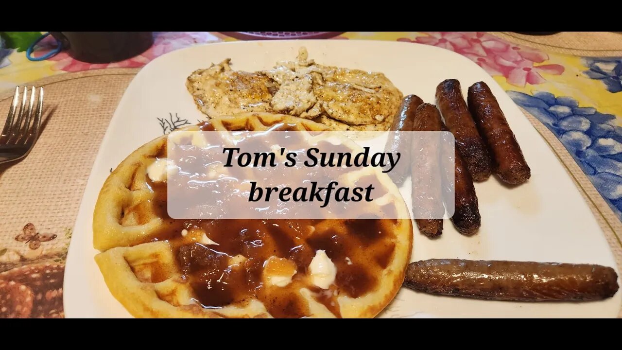 Tom's Sunday breakfast Waffles with apple pie syrup and eggs and sausage #breakfast