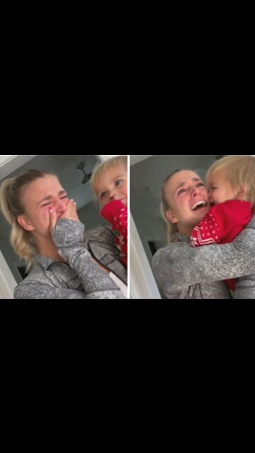 Emotional mother surprised with positive pregnancy test