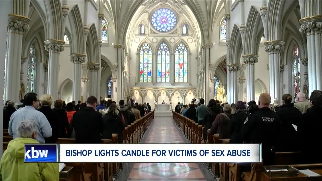 On Ash Wednesday, Bishop lights candle for victims of sex abuse