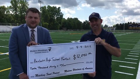 Modern Woodman of Holt Present Check to Haslett Football Team