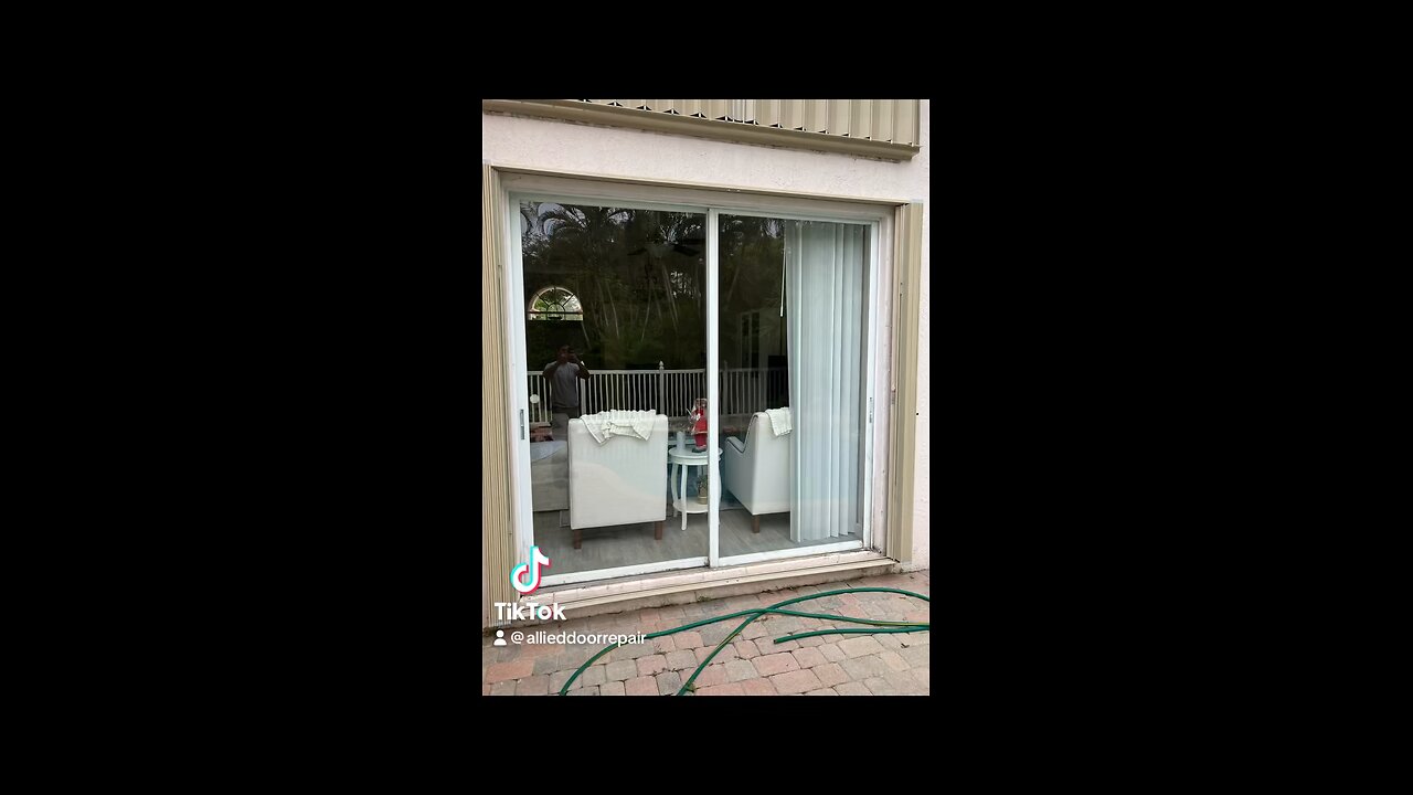 Sliding glass door repair; roller replacement, track refurbishing in Coconut Creek, Florida.