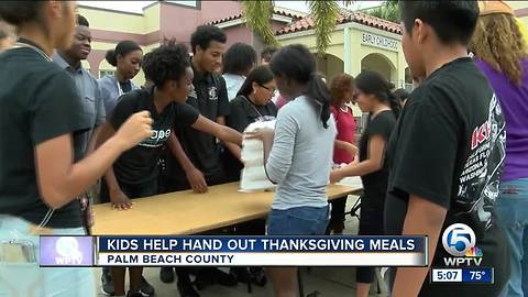 Palm Beach Harvest teams with students to distribute free meals