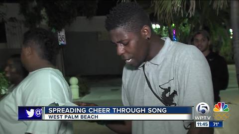 Carolers take to inner city streets to spread joy of Christmas