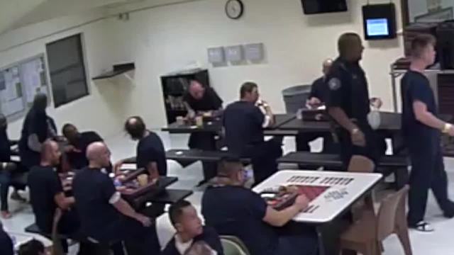 Denver Sheriff’s deputy caught on camera flipping inmate’s tray of food; deputy suspended