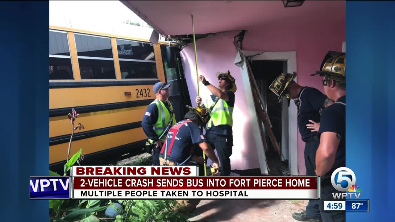 Vehicle crash sends school bus into Fort Pierce home.