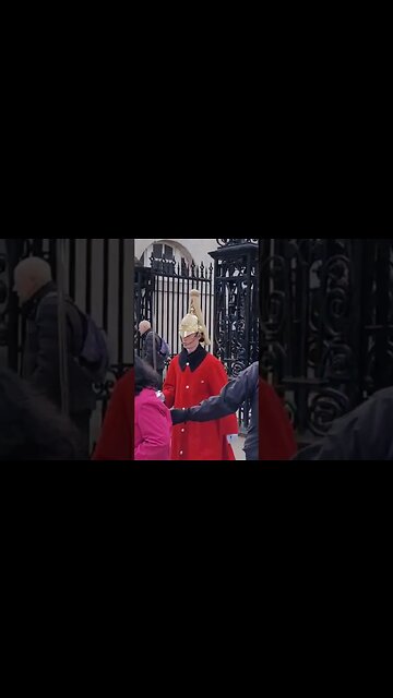 Husband guides wife out of the way #horseguardsparade