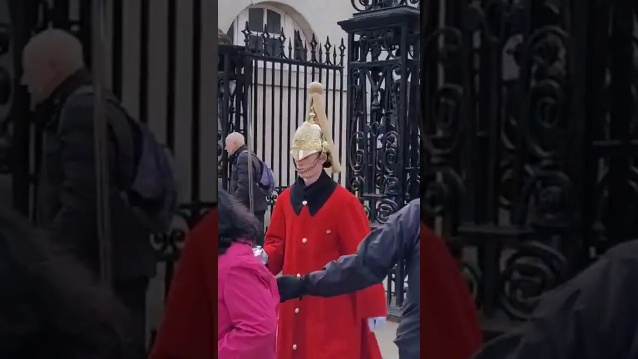 Husband guides wife out of the way #horseguardsparade