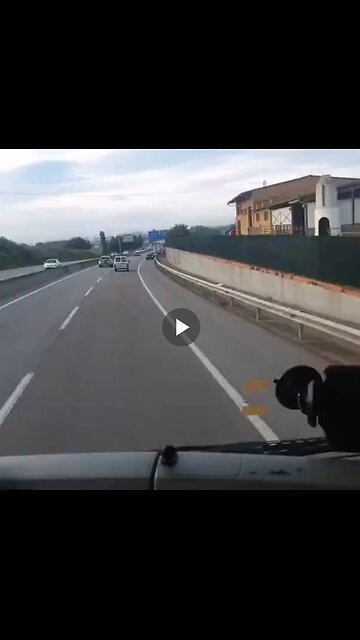 A bunch of drivers think that the hard shoulder is the exit lane and start piling up behind a truck