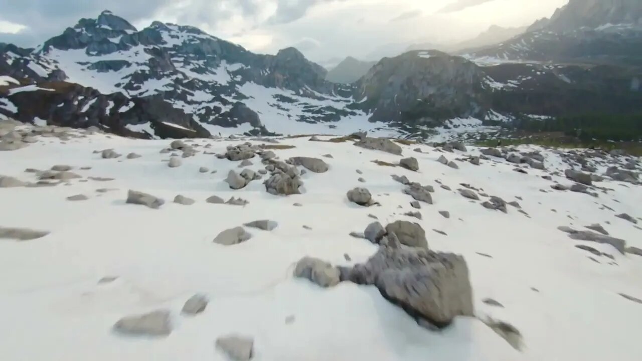 Drone Footage Of A Mountain Landscape With Snow 4K