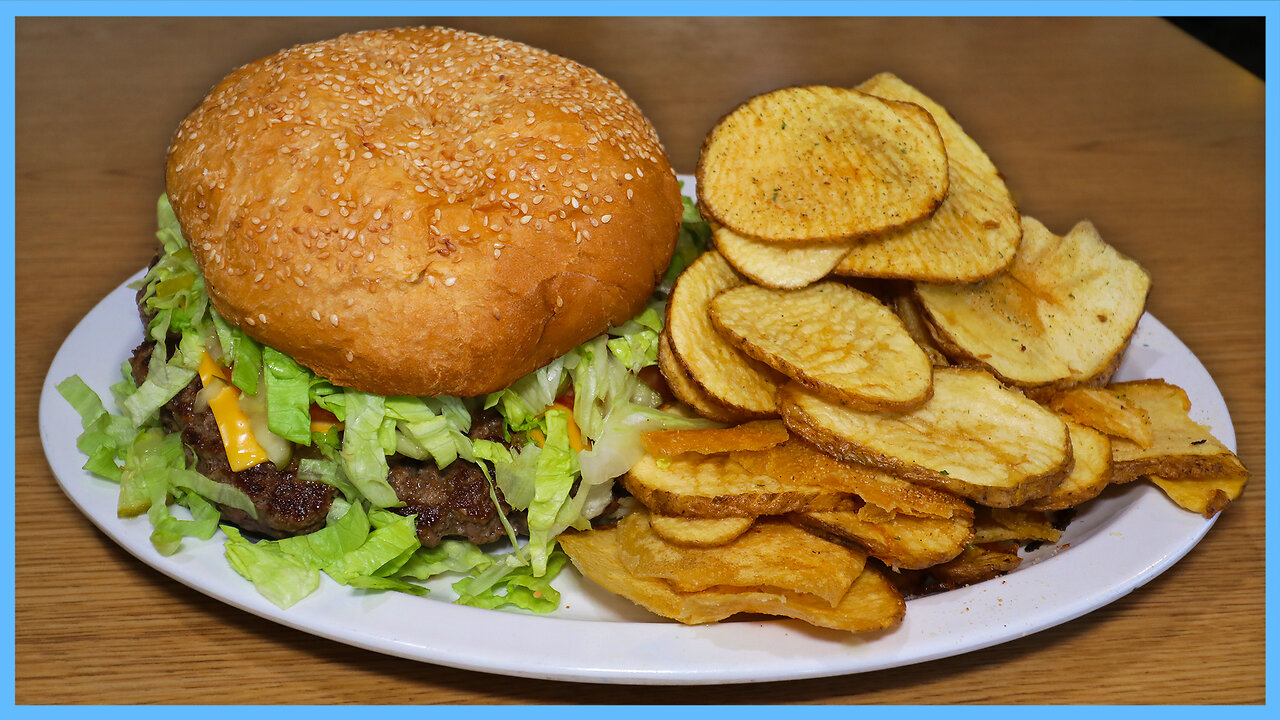 THIS MONSTER BURGER CHALLENGE COMES WITH A MOUNTAIN OF CRUNCY SPUDS!