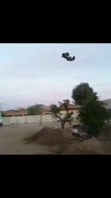 RC car catches air jumping ramp