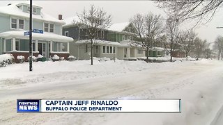 Woman finds burglar in home after shoveling