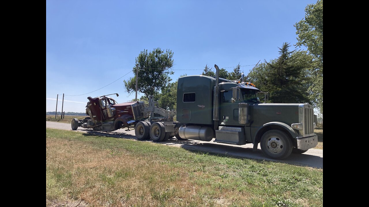 Truck Parts-Hauling Burnt Truck to the Bone Yard.