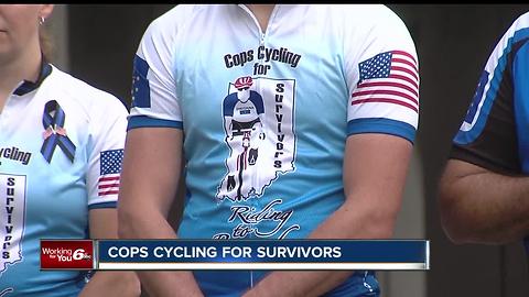 Police officers bike to support family members of officers killed in the line of duty