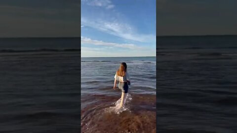Walking into the ocean