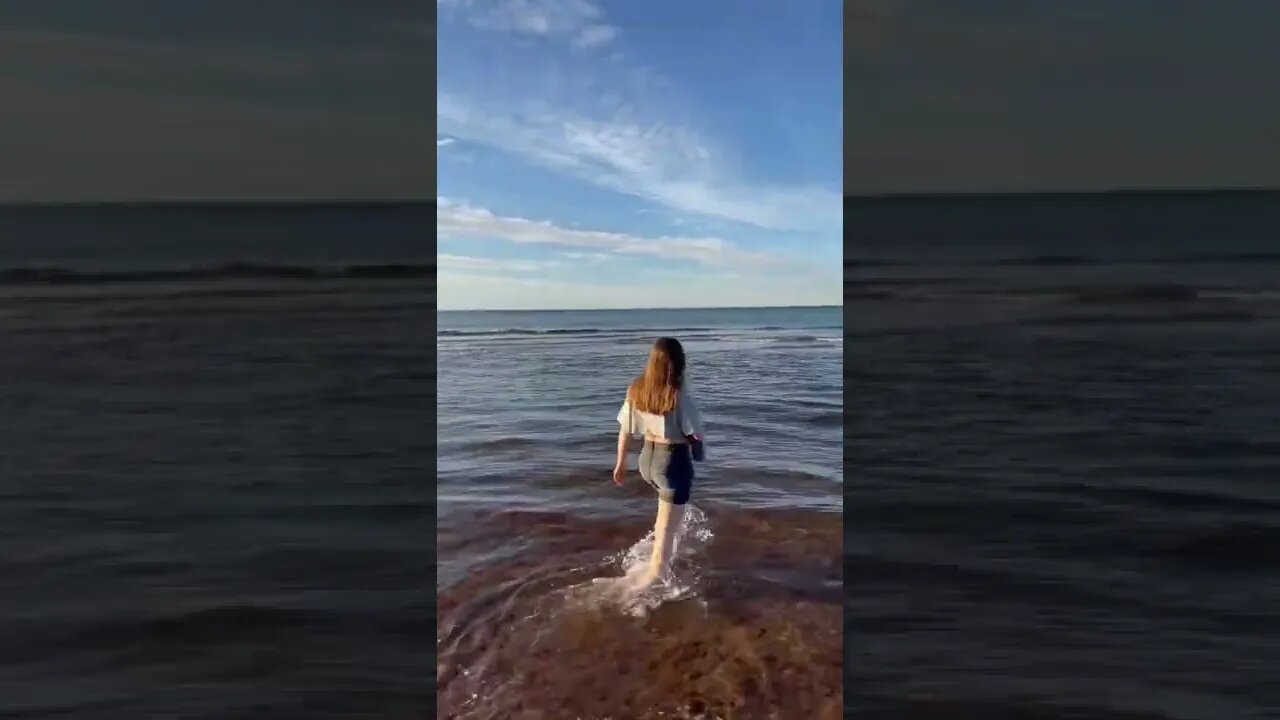 Walking into the ocean