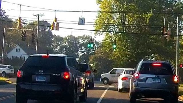 White Van Runs Red light