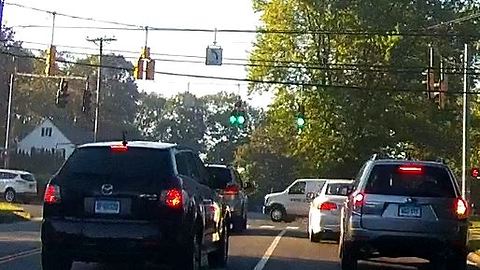 White Van Runs Red light