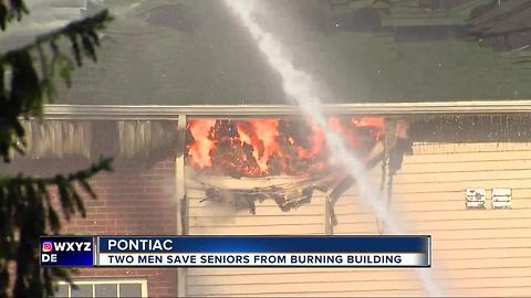 Men save seniors from burning building