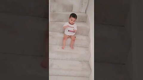 Cute baby 🤪😜 trying to open a chocolate bar. #viral #trending #chocolate #shorts