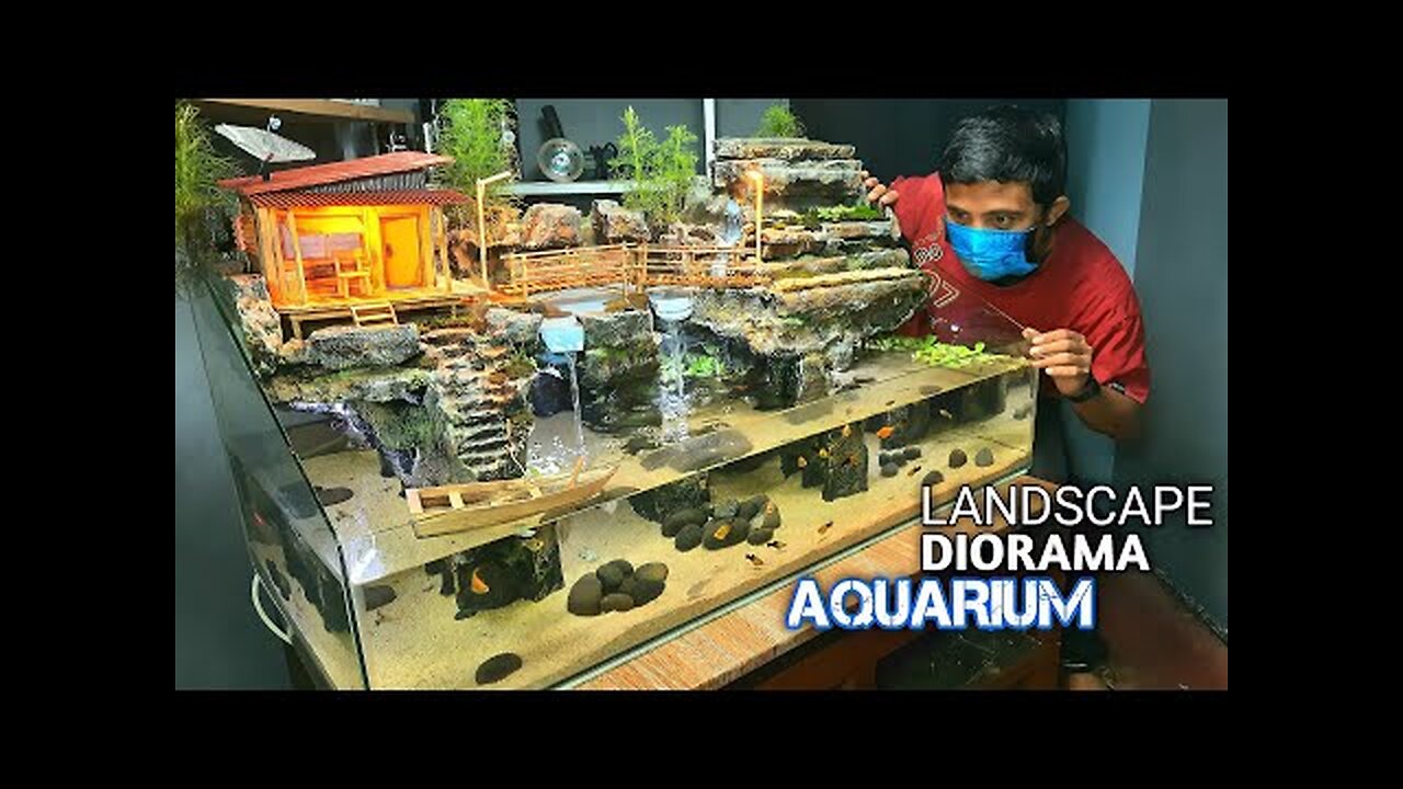 I turned a broken aquarium into a water 💦 fall diorama aquarium ( made aquarium decorations)